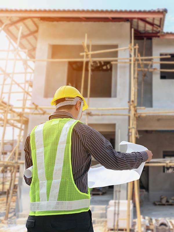 Professional engineer architect worker with protective helmet an